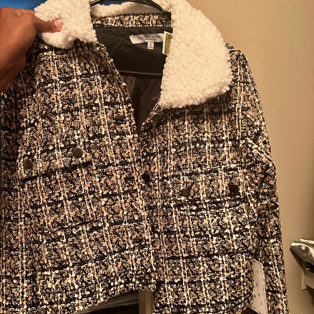 Tan white & black jacket with fur at the collar